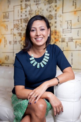 Gabrielle Martinez (standing in her newly renovated Chicago office) credits her family for her entrepreneurial spirit. “I grew up watching my aunts, uncles, and grandparents start their own business and compete in an oversaturated and very competitive market—and actually succeed,” she says.