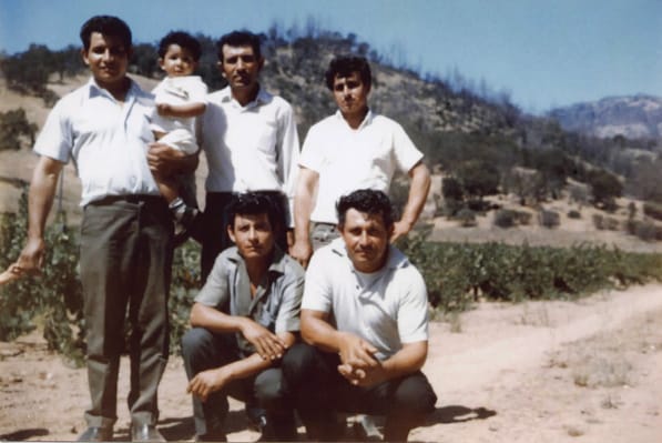 Robledo’s grandfather Everardo Robledo “Papa Lalo” (kneeling front, left) is pictured here in the only photo she has of him. By the time the photo was taken (the 1960s), the Robledo’s were known as master grafters in the wine industry and were sought-after in the new development of vineyards.
