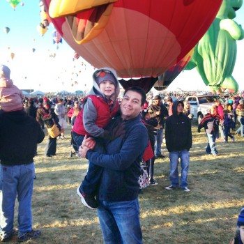 Lopez and his son Max at the Albuquerque International Balloon Fiesta, the world’s premier hot air balloon event, near Lopez’s hometown. 