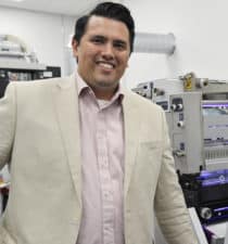 Dr Paulo Vieira, Flint Group, portrait manufacturing facilities background thumbnail
