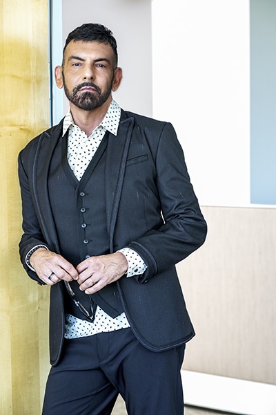 Miguel Sanchez, TiVo, portrait leaning against wall