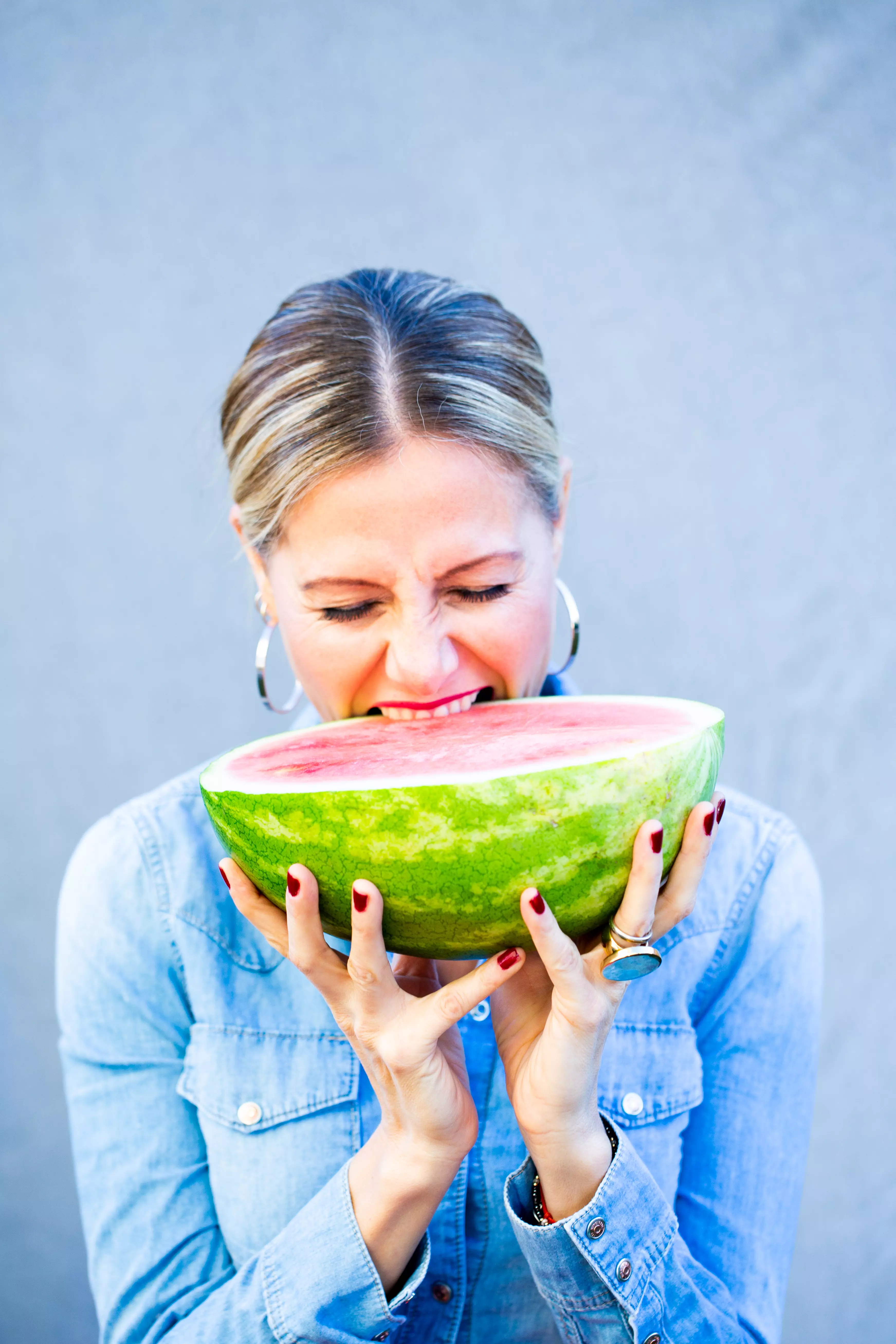 Alejandra Graf biting a watermelon