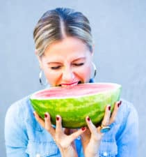 Alejandra Graf, biting into watermelon, thumb