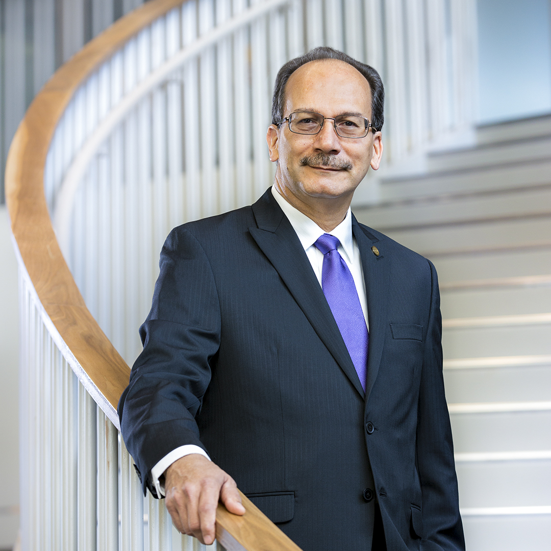 Havidán Rodríguez, President, University at Albany - portrait on stairs