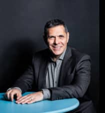 Daniel Lubetzky, KIND Snacks, sitting hands on table_thumbnail