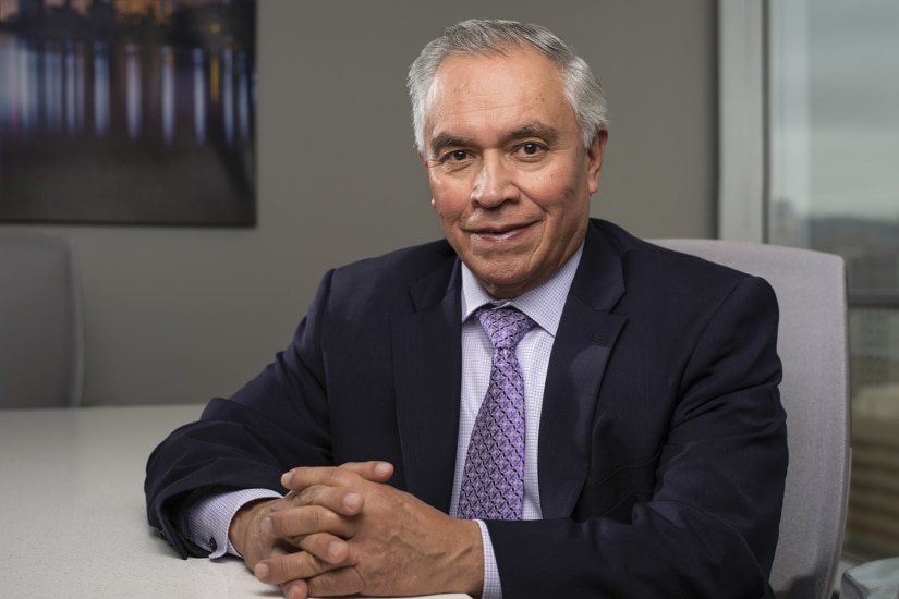 David Chavez, Senior Advisor, SVN | QAV & Associates portrait hands crossed