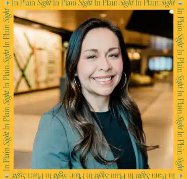 Headshot of Deanna Hernandez, field marketing officer at McDonald's, atop a yellow two-tone background.